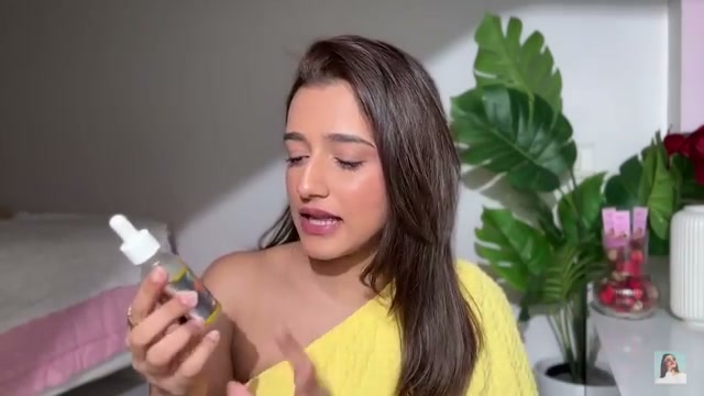 @aashiadani reviewing Garnier Vitamin C+ Serum at 02:14 in a YouTube Shorts video