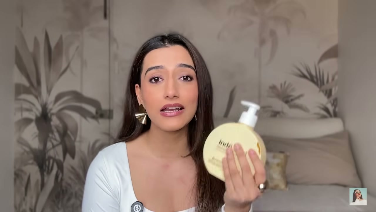 @aashiadani reviewing indē wild Champi Bond Repair Conditioner at 06:23 in a YouTube Shorts video