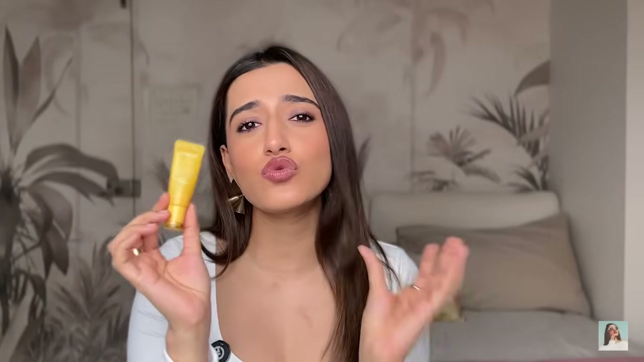 @aashiadani reviewing Laneige Lip Glowy Balm at 14:52 in a YouTube Shorts video