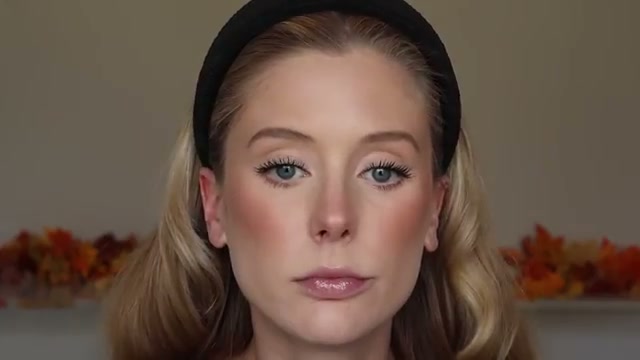 @abbeyyung reviewing Clinique Moisture Surge Hydro Plump Lip Treatment at 15:05 in a YouTube Shorts video