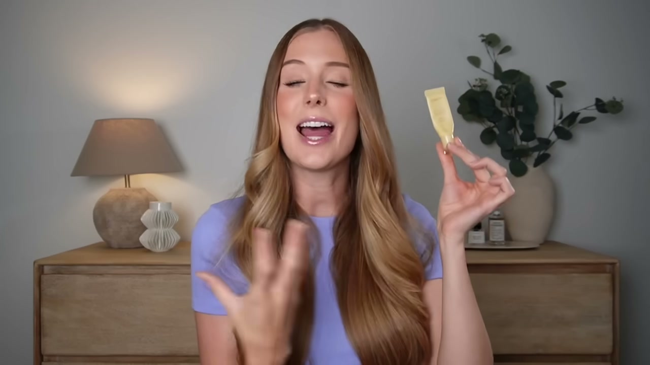 @abbeyyung reviewing Laneige Lip Glowy Balm at 05:47 in a YouTube Shorts video