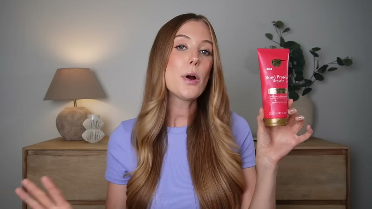 @abbeyyung reviewing OGX Bond Protein Repair 1-Minute Treatment Mask at 19:47 in a YouTube Shorts video