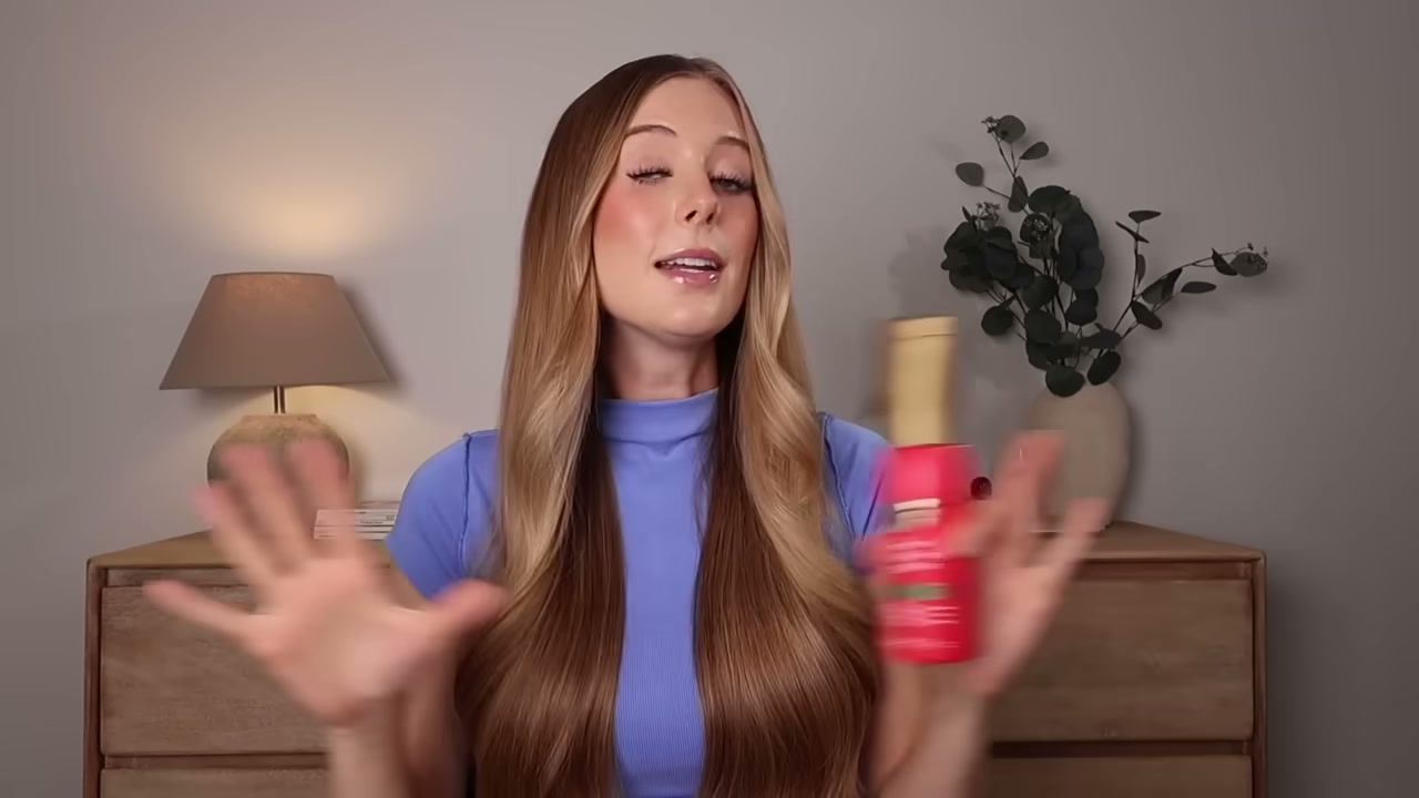 @abbeyyung reviewing OGX Bond Protein Repair Heat Protect Spray at 06:48 in a YouTube Shorts video