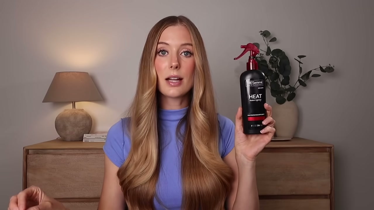 @abbeyyung reviewing Tresemmé Protecting Heat Styling Spray at 04:27 in a YouTube Shorts video