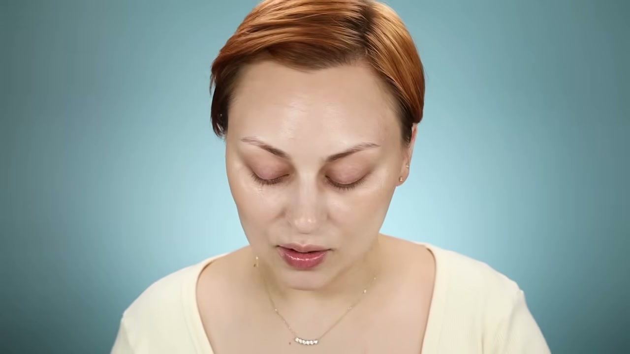 @alexandraanele reviewing Glossier Cloud Paint at 14:43 in a YouTube Shorts video