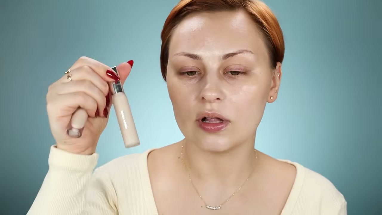 @alexandraanele reviewing Haus Labs Concealer at 15:33 in a YouTube Shorts video