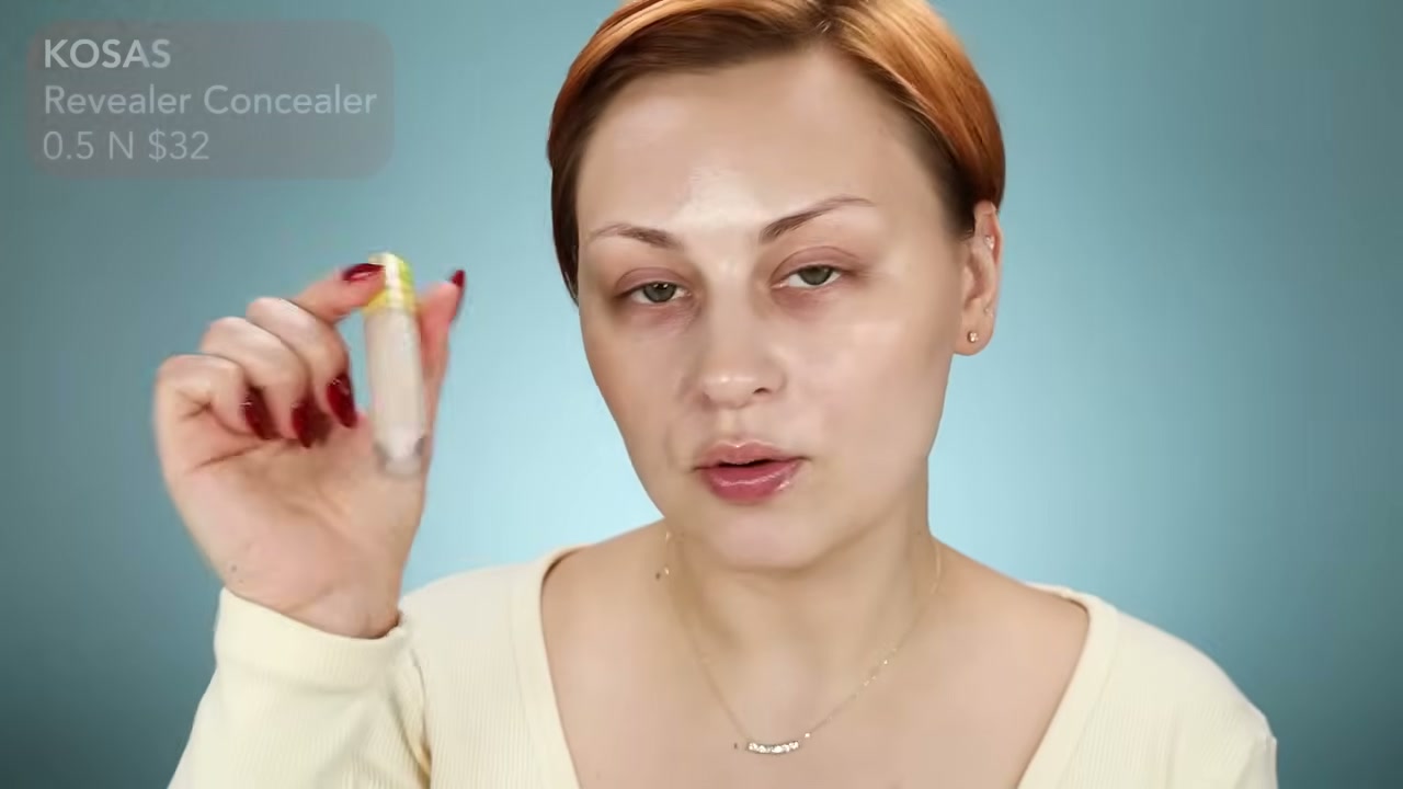 @alexandraanele reviewing Kosas Revealer Concealer at 15:12 in a YouTube Shorts video