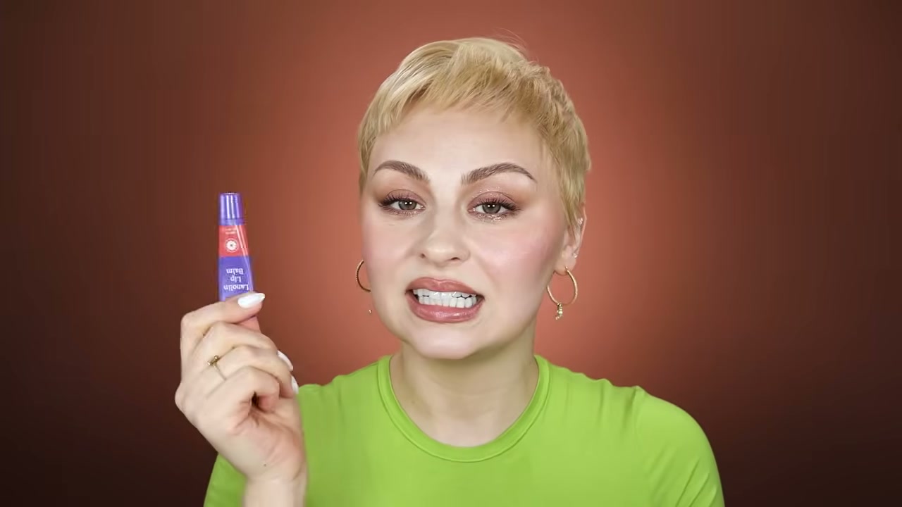 @alexandraanele reviewing Lansinoh Lip Balm at 16:08 in a YouTube Shorts video