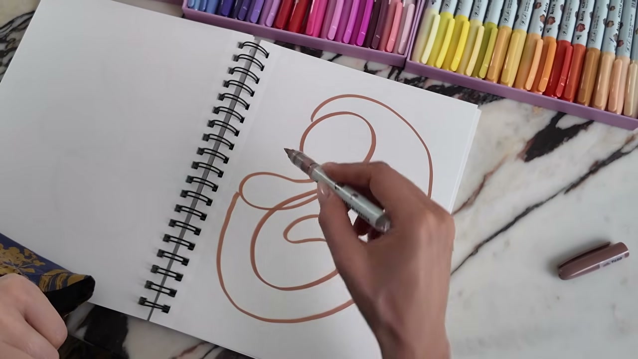 @aliandreea reviewing Arrtx Acrylic Markers at 28:06 in a YouTube Shorts video