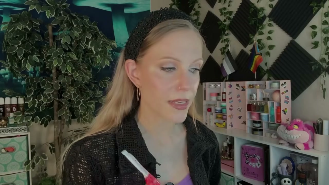 @aliceintherabbithole reviewing Kopari Beauty Lip Glossy at 11:45 in a YouTube Shorts video
