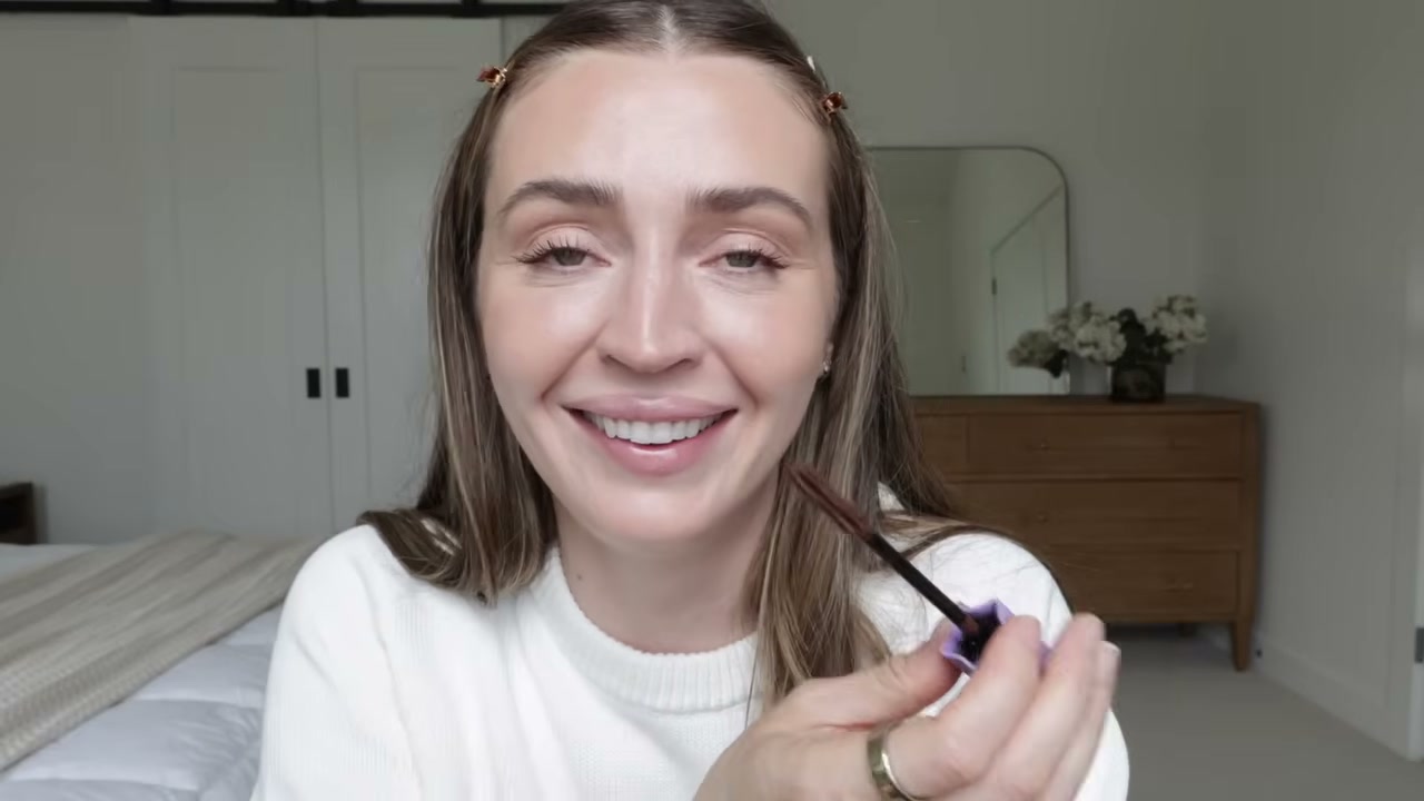 @allanaramaa reviewing Marc Jacobs Beauty Volume Mascara at 15:33 in a YouTube Shorts video
