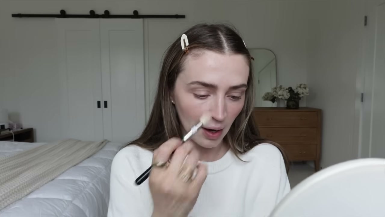 @allanaramaa reviewing Tower 28 Beauty Serum Concealer at 09:16 in a YouTube Shorts video