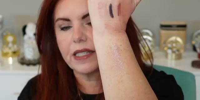 @allfeisty reviewing Chantecaille Luminescent Eye Shades at 18:14 in a YouTube Shorts video