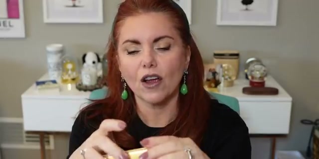 @allfeisty reviewing Clé De Peau Eyeshadow Quad at 09:27 in a YouTube Shorts video