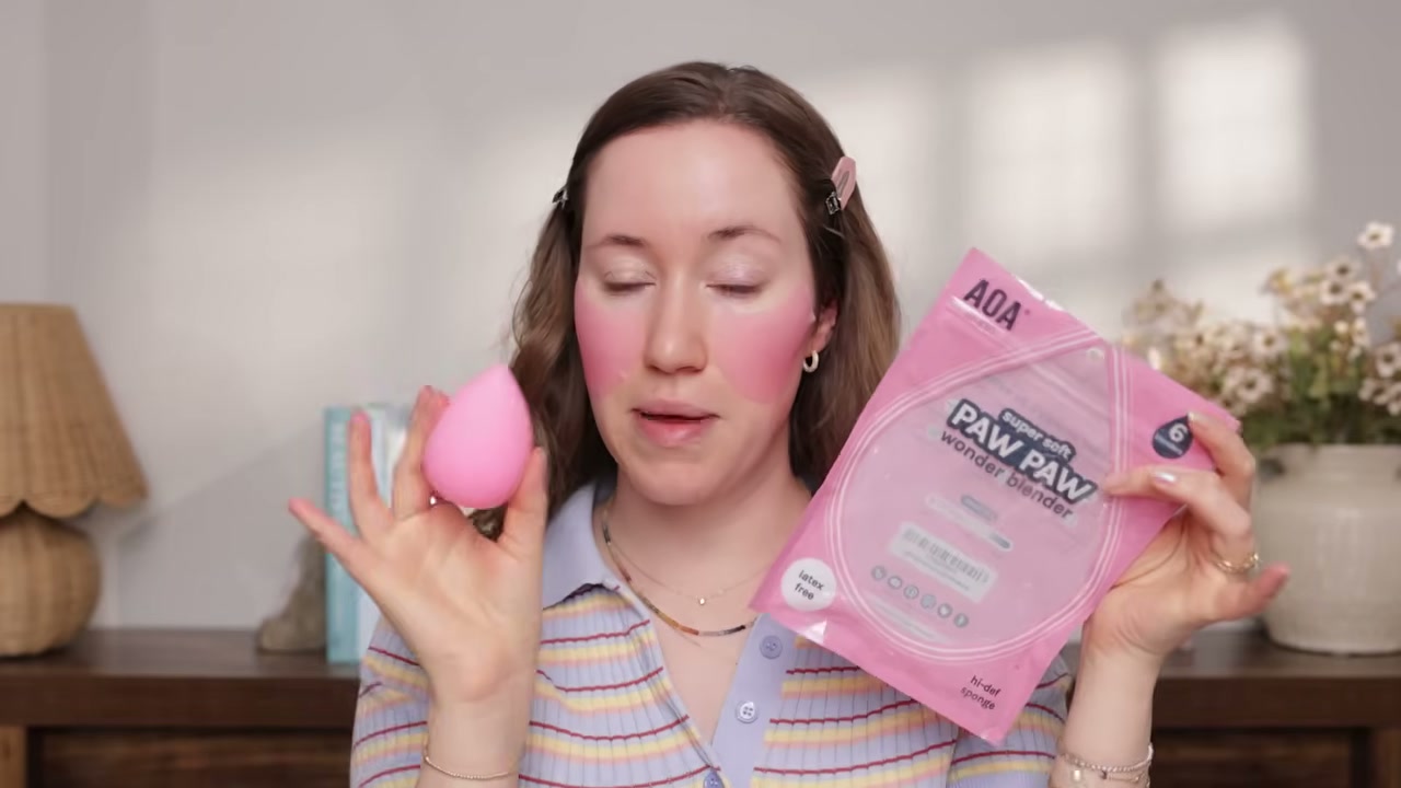 @allieglines reviewing AOA Studio Paw Paw Wonder Blenders at 03:11 in a YouTube Shorts video