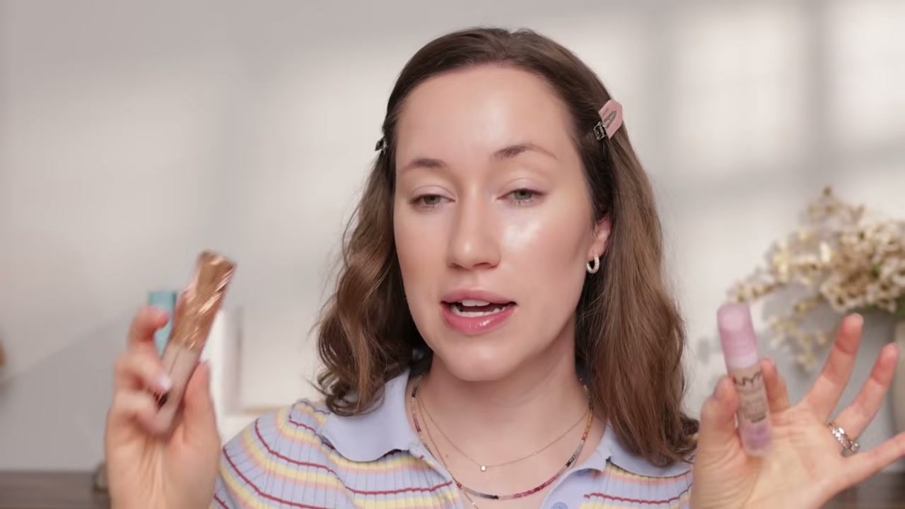 @allieglines reviewing Charlotte Tilbury Airbrush Flawless Blur Concealer at 00:10 in a YouTube Shorts video