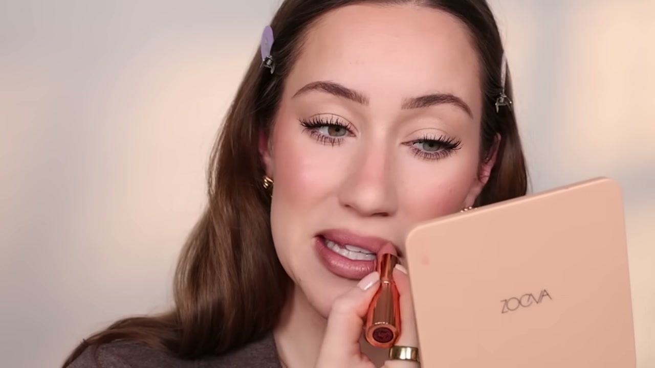 @allieglines reviewing Charlotte Tilbury K.I.S.S.I.N.G Lipstick at 22:23 in a YouTube Shorts video