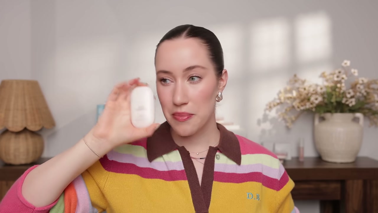 @allieglines reviewing Kylie Cosmetics Skin Tint Blurring Elixir Foundation at 08:09 in a YouTube Shorts video