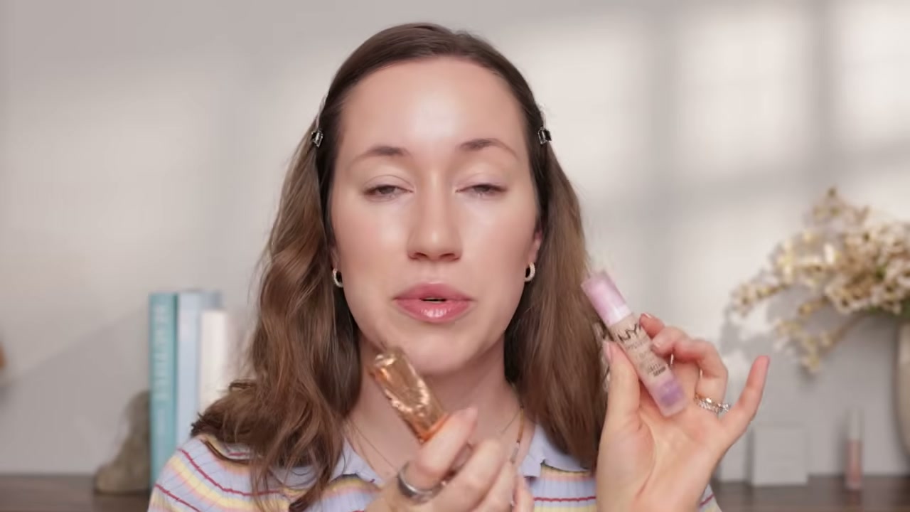 @allieglines reviewing NYX Bare With Me Concealer Serum at 10:23 in a YouTube Shorts video
