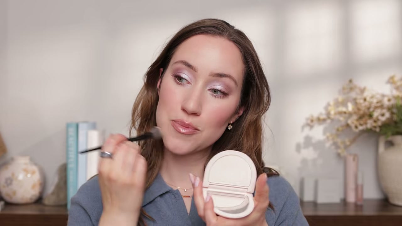 @allieglines reviewing Rare Beauty Pressed Powder at 19:19 in a YouTube Shorts video
