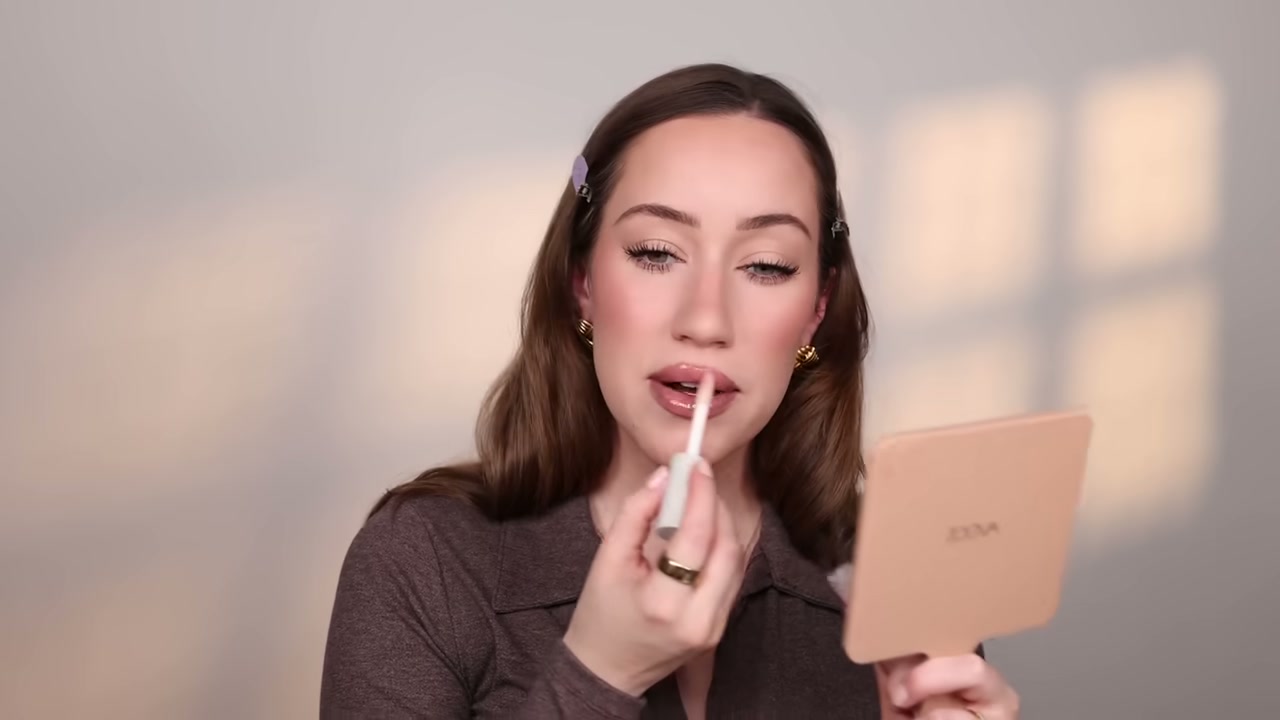 @allieglines reviewing Ravie Beauty Lip Renewal Treatment Oil at 22:56 in a YouTube Shorts video