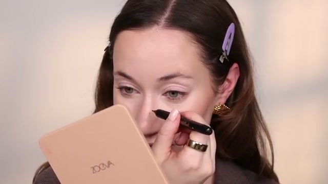@allieglines reviewing Rudi Berry Faux Freckle Pen at 07:22 in a YouTube Shorts video