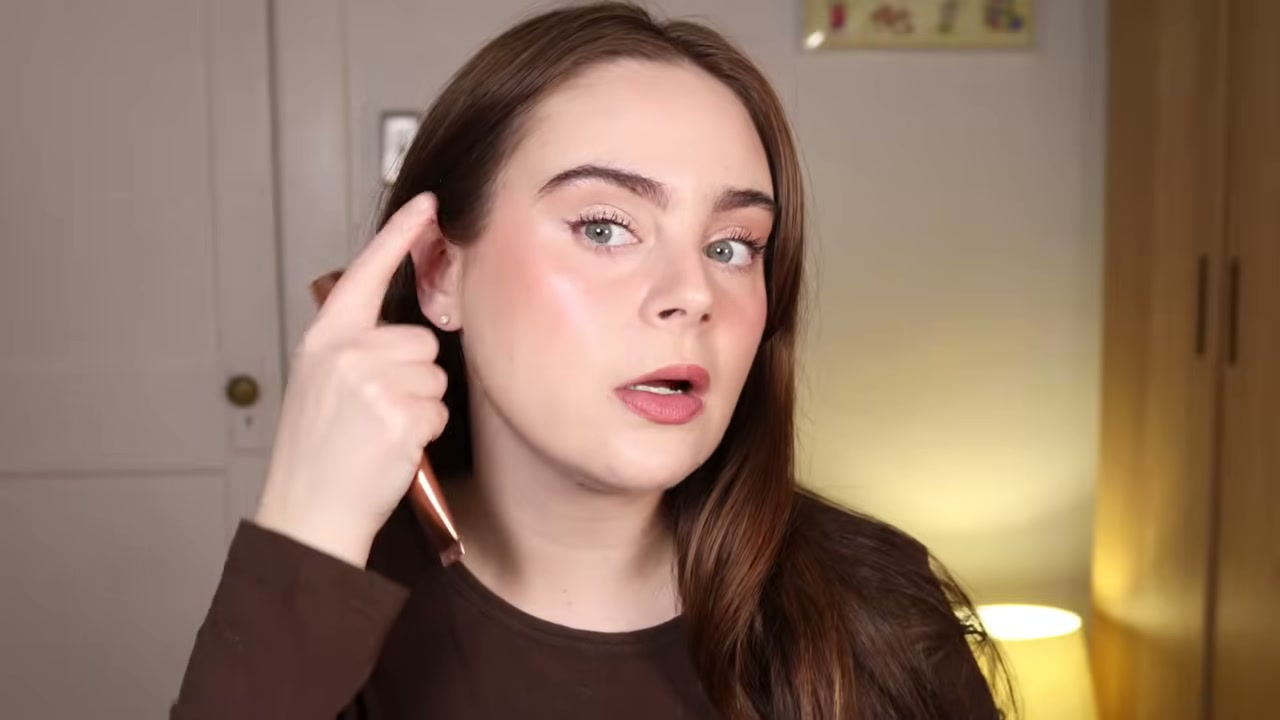 @amandaz reviewing Charlotte Tilbury Beauty Light Wand at 18:33 in a YouTube Shorts video