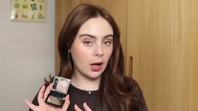 @amandaz reviewing Dior Beige Mitzah at 15:51 in a YouTube Shorts video