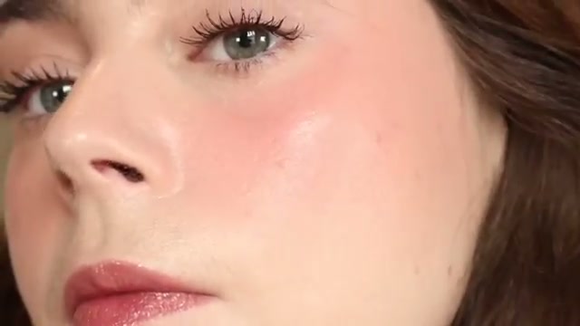 @amandaz reviewing Dior Cherry at 10:22 in a YouTube Shorts video