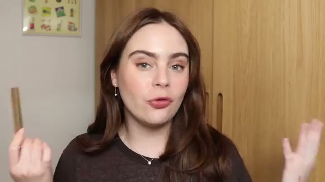 @amandaz reviewing Hourglass Volumizing Glossy Balm at 23:24 in a YouTube Shorts video