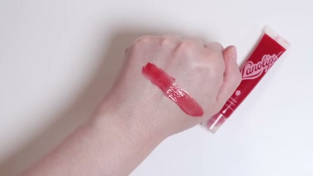 @amandaz reviewing Lanolips Jelly Balm at 05:14 in a YouTube Shorts video
