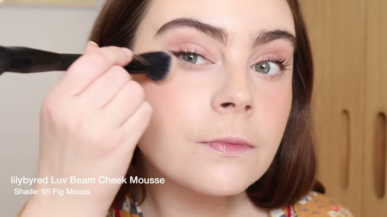 @amandaz reviewing lilybyred Love Beam Cheek Mousse at 14:25 in a YouTube Shorts video