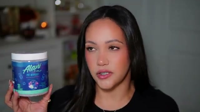 @amyglam reviewing Alani Nu Pre-Workout at 02:32 in a YouTube Shorts video