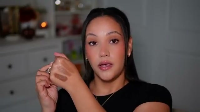 @amyglam reviewing CoverGirl True Blend Sun & Sculpt Bronzing Glow Serum at 14:43 in a YouTube Shorts video