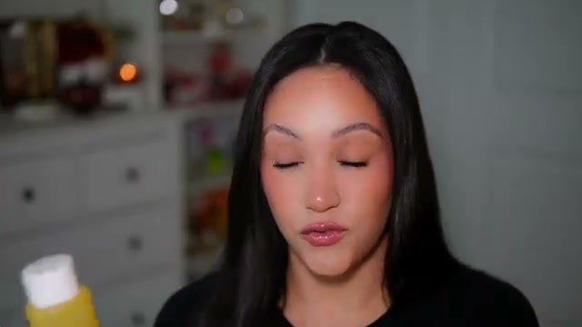 @amyglam reviewing Farmacy Honey Milk Essence at 25:39 in a YouTube Shorts video