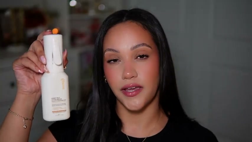 @amyglam reviewing Gisou Honey Milk Active Repair Leave-In Conditioner Mist at 12:15 in a YouTube Shorts video