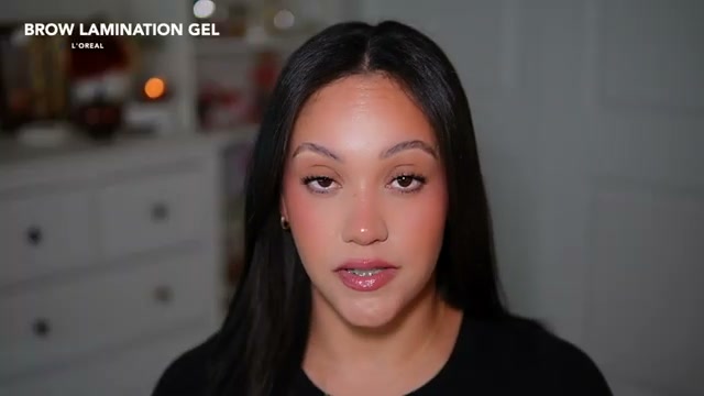 @amyglam reviewing L'Oreal Paris Brow Lamination Gel at 14:42 in a YouTube Shorts video