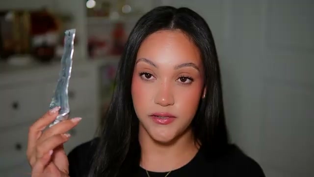 @amyglam reviewing Marvis Whitening Mint Toothpaste at 05:42 in a YouTube Shorts video