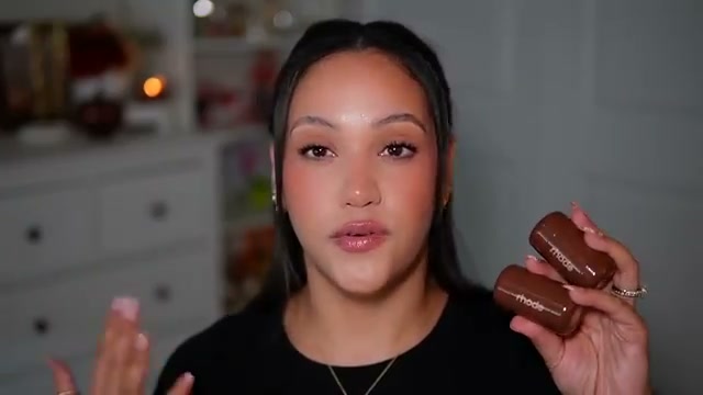 @amyglam reviewing Rhode Pocket Bronze at 13:34 in a YouTube Shorts video