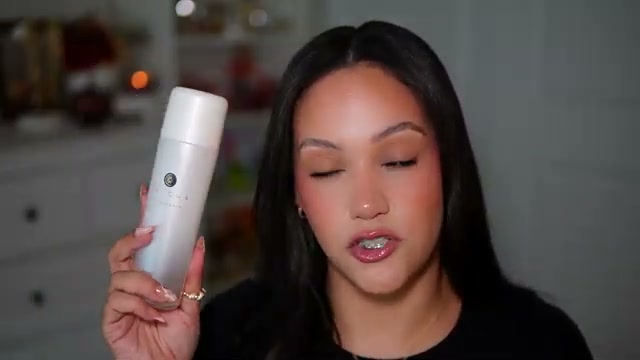 @amyglam reviewing Tatcha The Essence at 23:07 in a YouTube Shorts video
