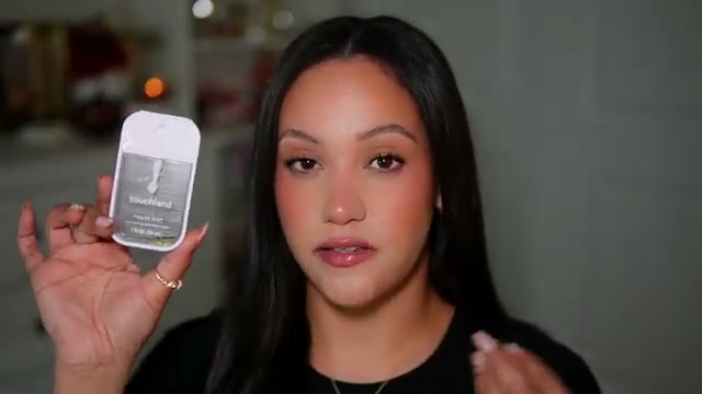 @amyglam reviewing Touchland Hand Sanitizer at 05:10 in a YouTube Shorts video