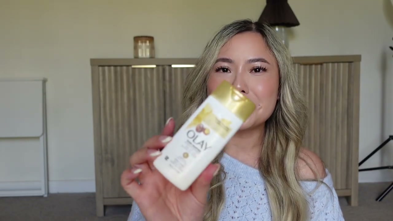 @amyswanofficial reviewing Olay Ultra Moisture Body Wash at 04:49 in a YouTube Shorts video