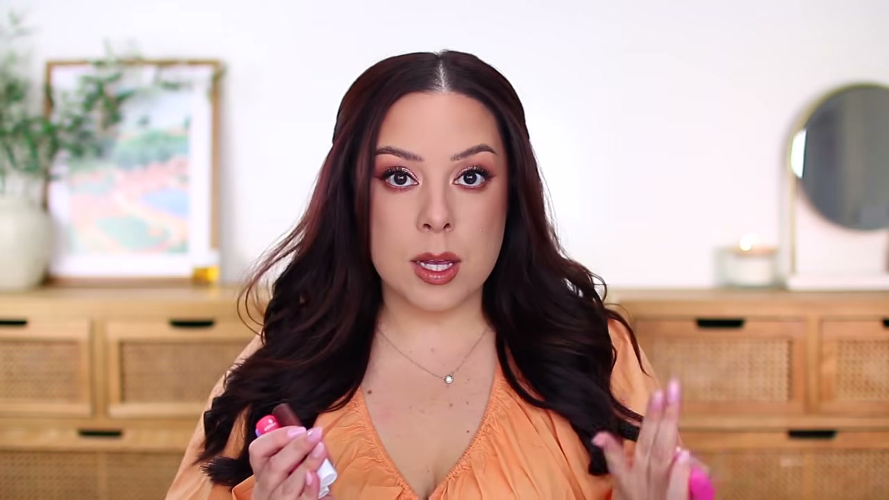 @andreamatillano reviewing Essence Juicy Bomb Glossy Butter Balm at 29:06 in a YouTube Shorts video