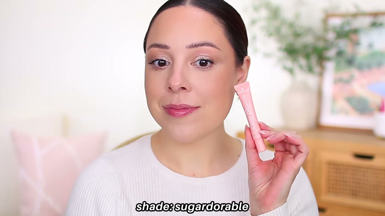 @andreamatillano reviewing Essence Super Peptide Glossy Lip Treatment at 03:20 in a YouTube Shorts video