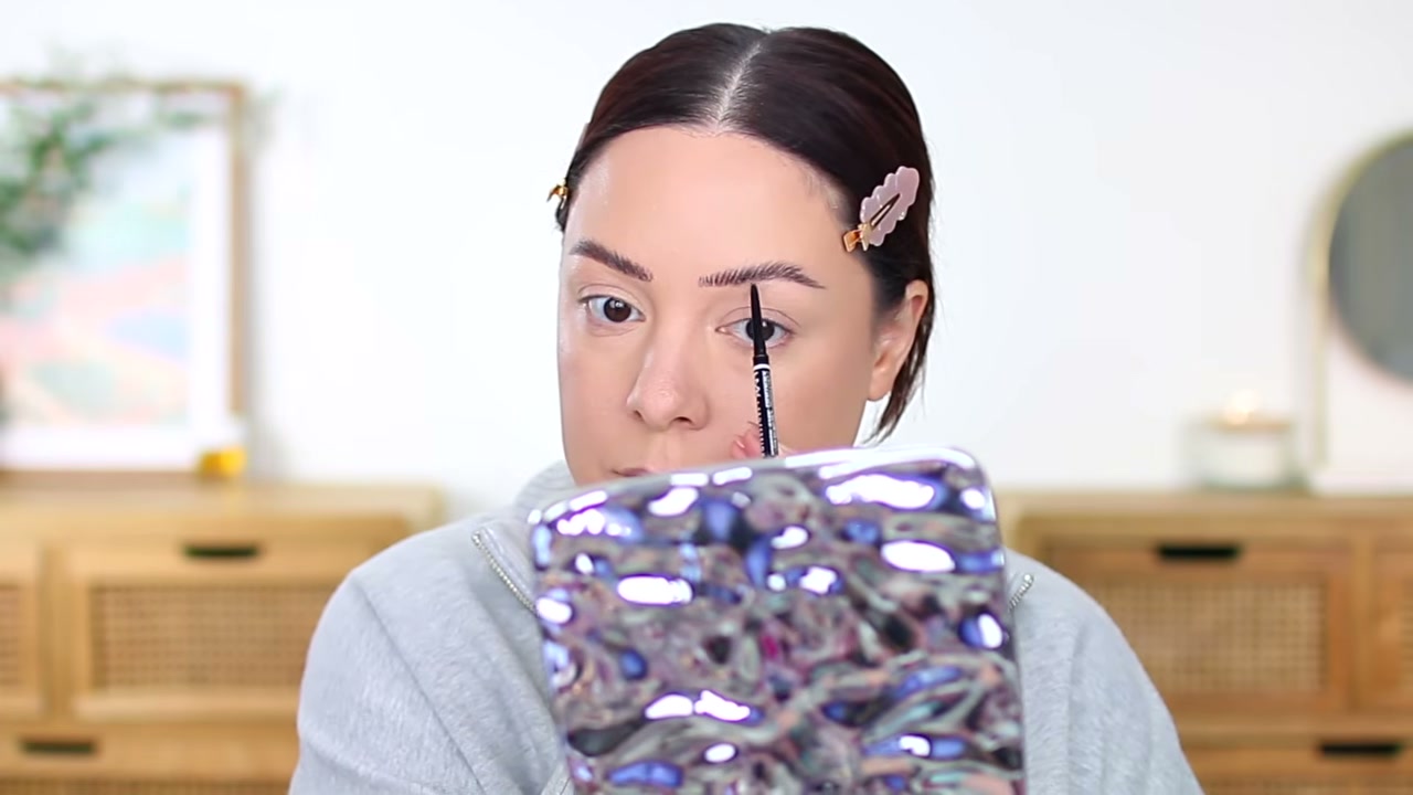 @andreamatillano reviewing NYX Micro Brow Pencil at 56:26 in a YouTube Shorts video