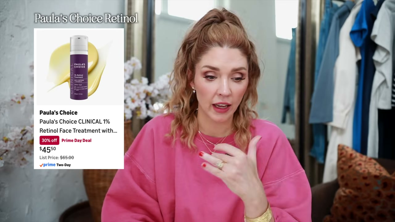 @angela.braniff reviewing Paula's Choice 1% Retinol at 14:21 in a YouTube Shorts video