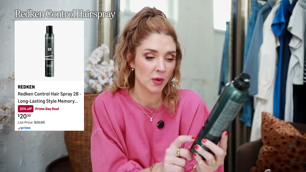 @angela.braniff reviewing Redken 28 Control Hold Hairspray Anti-Humidity Spray at 16:59 in a YouTube Shorts video