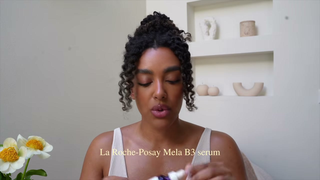 @angela.onuoha reviewing La Roche-Posay Mela B3 Serum at 10:14 in a YouTube Shorts video