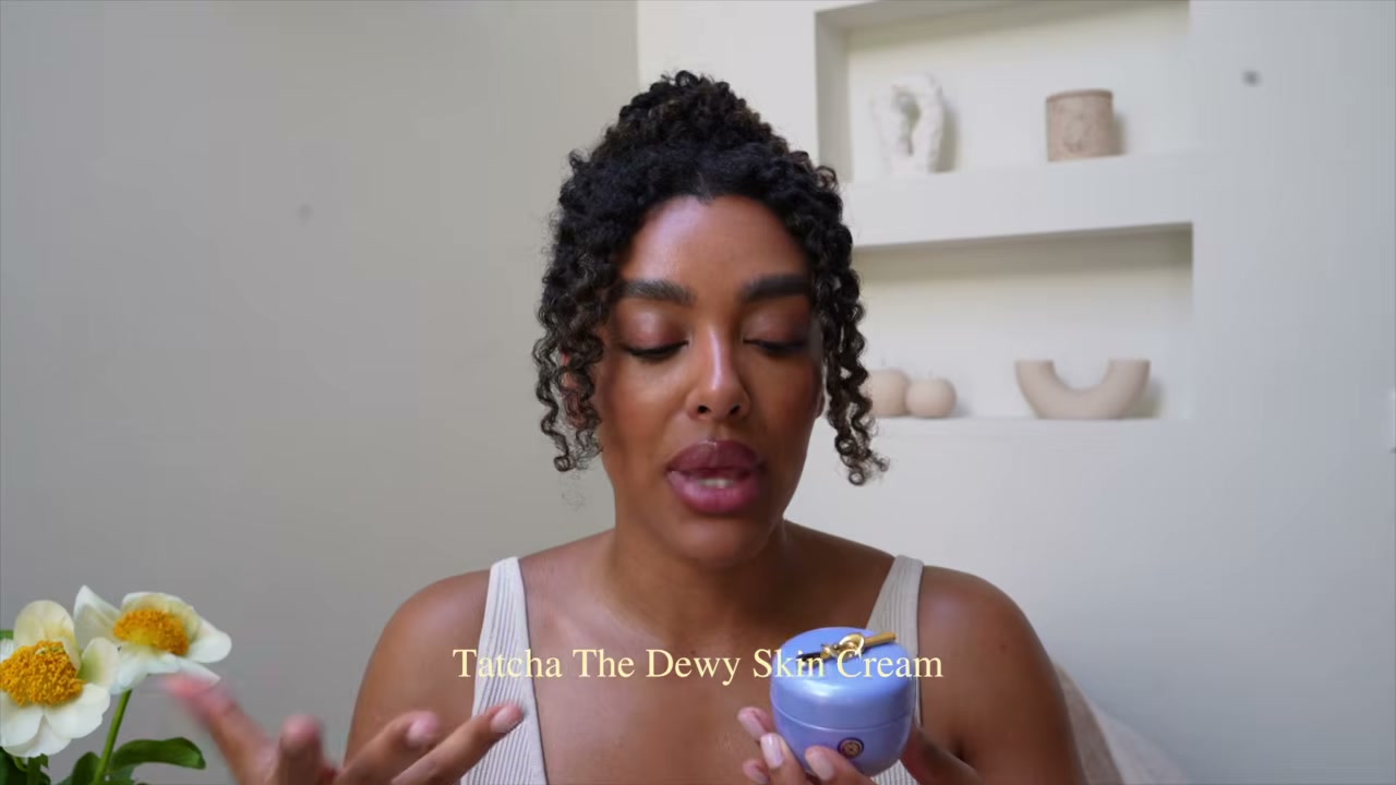 @angela.onuoha reviewing Tatcha The Dewy Skin Cream at 10:31 in a YouTube Shorts video