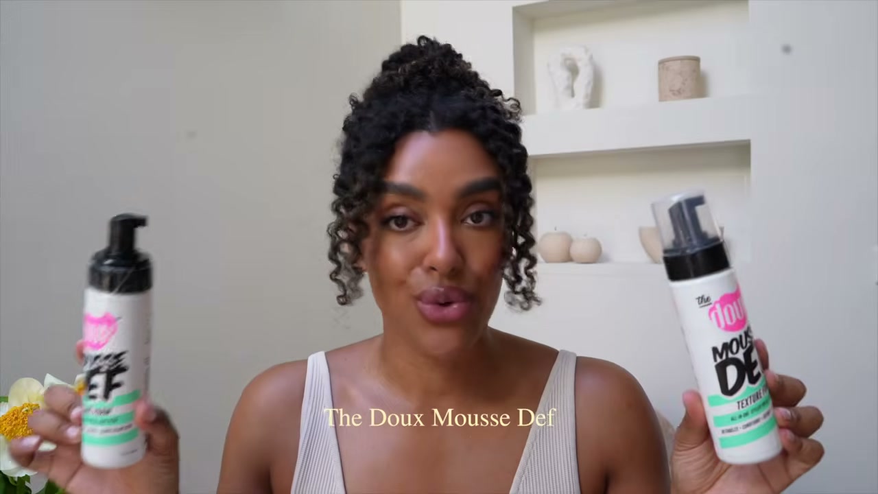 @angela.onuoha reviewing The Doux Mousse Def at 12:46 in a YouTube Shorts video